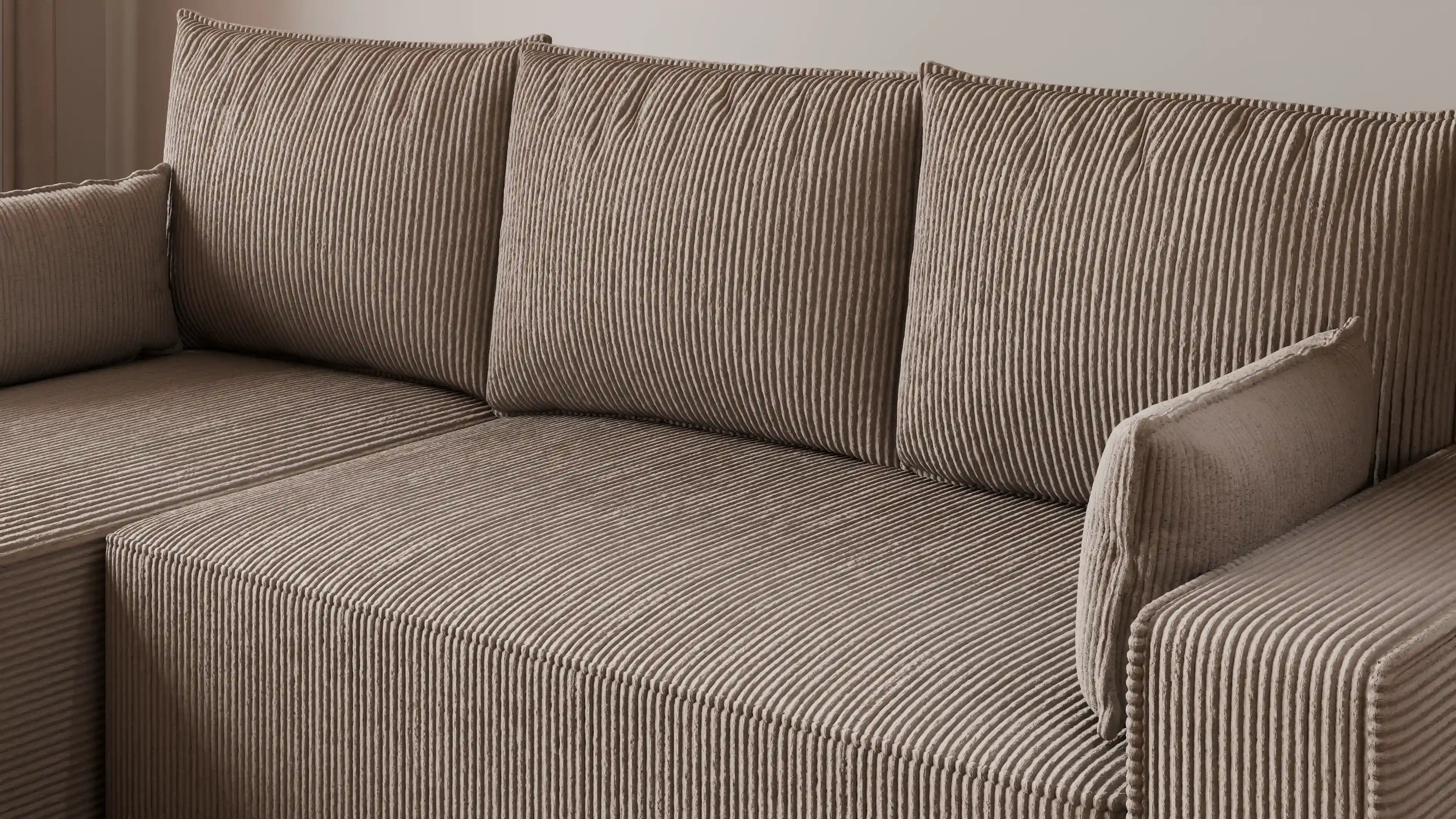 Narożnik tapicerowany NEXO – uniwersalny, z funkcją spania i pojemnikiem